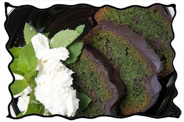 Slices of mint chocolate cake and whipped cream