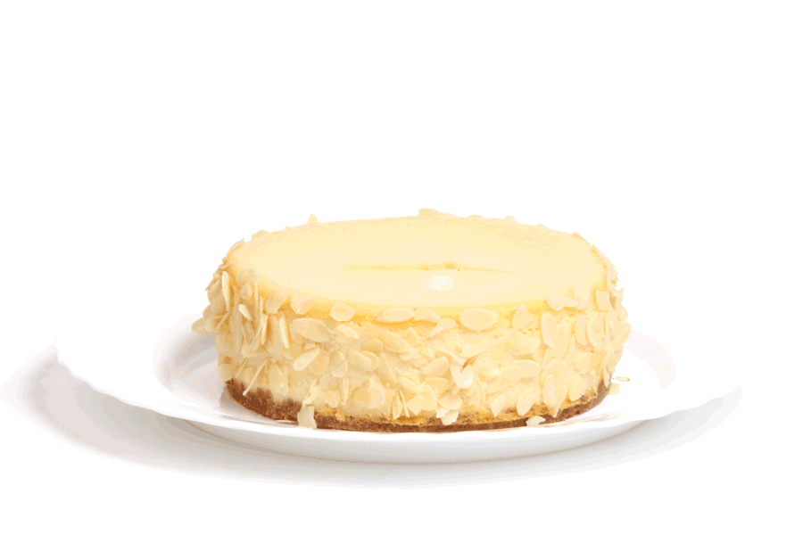 New York cheesecake decorated with almond slices